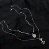 Hip hop oso explosivo extremidades móviles collar apilado de doble capa cadena de suéter larga de moda para mujer cadena de suéter con temperamento