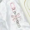 Llavero de lazo colorido con perlas, accesorios hechos a mano para fundas de teléfono, audífonos, bolsos y accesorios de ropa
