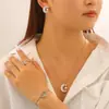 Pendientes, Anillos, Pulseras, Collares de Sol y Luna con Incrustaciones de Circonita de Cobre Transfronterizos Europeos y Americanos, Joyería de Moda para Mujer con Bloques de Color de Sol y Luna
