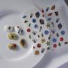 Procesamiento de liquidación nueva tecnología pegatinas de uñas de flores japonesas al por mayor relieve con pegatinas de uñas adhesivas 5D lindas
