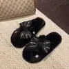 Nuevas zapatillas de algodón para interior estilo coreano con lazo y fondo plano, zapatillas peludas de otoño e invierno, dulces y antideslizantes para uso doméstico