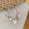Collar de cuentas con múltiples colgantes de margarita en forma de corazón para mujer, cadena para clavícula de temperamento dulce, súper bonito, estilo chica dulce, juvenil, accesorios