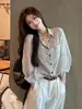 Camisa protectora del sol a rayas vintage estilo francés para mujer, nuevo diseño casual fino de otoño 2026, camisa holgada de manga larga