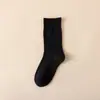 Calcetines de media pantorrilla para mujer Zhuji, color liso, borde superior holgado, sin costuras, calcetines transpirables para el posparto, calcetines de algodón para mujer de otoño e invierno, venta al por mayor