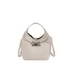 Bolso de mano de nicho estilo coreano para mujer, nueva colección de invierno 2026, bolso de hombro retro, adecuado para el trabajo y los desplazamientos, bolso tipo cubo