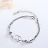 Pulsera temperamento cabello generación de fábrica damas pulsera de cristal en forma de corazón hueco pulsera coreana flor de coche diamante trébol de cuatro hojas