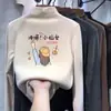 Nueva camiseta versátil de manga larga estilo coreano para otoño e invierno para niños, con cuello alto cálido y hecha de un tejido suave y cómodo