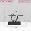 Escultura abstrata em metal preto minimalista italiano, adequada para sala de estar, mesa, hall de entrada ou decoração de casa modelo