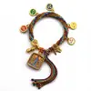 Pulseira do deus da riqueza de cinco vias estilo Xizang oito santos padroeiros cinco mestres Manjushri deus da riqueza amarelo thangka corda tecida à mão pulseira do ano desta vida