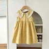 Vestido de Verano para Bebé Niña 2026 Estilo Nuevo Cuadros Amarillos Encaje Solapa Sin Mangas Estilo Coreano Dulce Vestido Chaleco