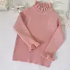 Colección de otoño e invierno 2026 transfronteriza: suéter tejido de uso diario y prenda base para niñas, ropa interior cálida y versátil de manga larga