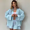 Conjunto de pijama de duas peças solto com top de manga longa em blocos de cor de algodão e linho e shorts com amarração na cintura 2026 Outono Europeu e Americano Novo Roupa de Casa