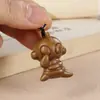 Sándalo Verde Tallado Ultraman Monstruo Pareja Cadena para Teléfono Móvil Colgante Madera Maciza Creativa Colgante para Bolsa Accesorios Personalizados para Hombres y Mujeres