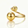 Anillo abierto de acero con bola de acero de estilo europeo y americano único, accesorio de mano de estilo exagerado, bola redonda chapada en oro de acero inoxidable, titanio de acero simple que no se decolora