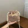 2026 Bolso Cubo Simple Estilo Nuevo Primavera y Verano Tejido Estilo Vacacional Bolso de Hombro Cruzado Bolso Casual de Moda