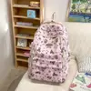 Mochila Escolar para Meninas do Ensino Fundamental 2024 Verão Novo Estilo Mochila Estampada para Alunos do Ensino Médio e Universitário Versátil Mochila para Notebook de Grande Capacidade