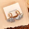 Pendientes Pequeños de Cristal Color Dorado Titanio Champagne Hoja de Ginkgo de Gama Alta, Pendientes Muy Bonitos para Mujer, Pendientes Estilo Nuevo 2026