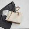 Bolso de gran capacidad de comercio exterior para mujer, primavera y verano 2025, nuevo bolso de hombro portátil a juego, bolso de mano de clase para ir al trabajo.