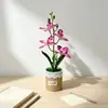 Quatro orquídeas Phalaenopsis artificiais estilo nórdico em vasos de tecido, flores artificiais e plantas verdes para bonsai de mesa, adereços de fotografia e itens decorativos