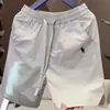 Novedad de Verano Estilo Perforado con Láser Transpirables Casuales Pantalones Cortos para Hombre, Simples, Modernos, Versátiles, Holgados, de Secado Rápido, Pantalones de Cinco Puntos de Seda Helada