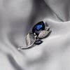 Nueva atmósfera de moda flor de cala de cristal flor de cobre broche atmósfera de alta gama moderno simple temperamento corsage