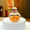 Nova Garrafa de Perfume Criativa em Formato de Coração Pequeno Pingente Areia Movediça DIY Joias Chaveiro Pulseira de Celular Pingente Atacado