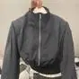 Chaqueta Ligera Corta con Protección Solar para Mujeres Menudas, Nuevo Estilo Europeo Verano 2026 Cuello Alto Exterior Delgado con Protección Solar