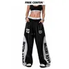 Pantalones de chándal brillantes de estilo americano con bloques de color y estampado de letras de alta costura, pantalones casuales holgados y fluidos de pierna ancha para mujer