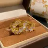 Brincos de Argola com Cravação de Diamantes Europeus e Americanos de Venda Quente Transfronteiriça, Brincos Versáteis de Moda de Luxo Leve Totalmente Cravejados, Brincos Elegantes para Mulheres