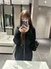 Chaqueta con capucha de estilo casual coreano para mujer 2025 Otoño e Invierno Nueva Versátil de cremallera estilo callejero suelta