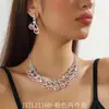 Fuente transfronteriza pedrería azul verdoso rojo collar aretes conjunto de dos piezas exquisito vestido de novia banquete collar