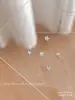 Nueva joyería para uñas de aleación flor de cinco pétalos decoración tridimensional para uñas taladro flor de perla exquisita accesorios transfronterizos al por mayor