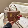 Bolso Pequeño de Moda Retro para Mujer Invierno 2026 Estilo Nuevo Bolso Cubo Pequeño Texturizado Bolso Cruzado Simple para Hombro para Mujer