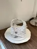 Bolsas de Nicho Super Populares para Primavera e Verão para Mulheres 2026 Nova Moda Versátil Bolsa de Ombro Transversal Bolsa de Mão Pequena Exquisita
