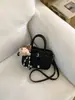 Bolso de Mano de Diseño de Alta Gama Transfronterizo de Nicho Elegante para Mujer Modelo Nuevo 2026 Lujo Ligero Versátil Moda Tendencia Bolso Cruzado