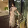 Ins transfronteiriço estilo europeu e americano 2026 nova moda elegante feminino atacado para o dia a dia gola redonda manga curta conjunto de saia estampada
