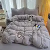 Nuevo Juego de Cuatro Piezas Clase A Algodón Lavado Color Sólido Funda de Edredón Individual Sábana Juego de Cuatro Piezas Gorro de Cama Juego de Tres Piezas Fresco Pequeño
