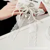 Bolso de Seda con Lazo de Perlas Doble Capa Estilo Francés Colgante de Amor Plateado Llavero Lazo de Perlas Estilo Ins