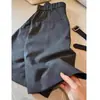¡Recomendación nivel CHAO! Pantalones capri de traje grises a rayas estilo old money 2026 principios de otoño cintura alta cubre caderas adelgazantes de longitud media