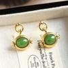 Pendientes Xirui S925 de plata esterlina chapados en oro con forma de huevo de jaspe Hotan natural. Elegantes y sencillos, ideales para regalar a mujeres.