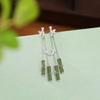 Yilu plata S925 plata esterlina chapado en oro jade de Hetian jade retro elegante aretes de botón de hoja de bambú moda nacional aretes estilo antiguo