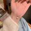 Collar de Perlas Coreano y Japonés Más Vendido para Mujer Sensación de Alta Gama Cadena para Clavícula de Plata Rota Diseño de Nicho Cadena Larga para Suéter Choker de Lujo Ligero