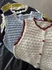 Chaleco de encaje a cuadros de punto hueco retro estilo japonés con botones para mujer, chaqueta suéter sin mangas que reduce la edad para otoño