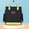 Nueva bolsa de tutoría para estudiantes con bloques de color estilo británico, bolsa cruzada impermeable de tela Oxford de gran capacidad para tutoría, bolsa de arte portátil