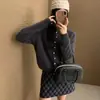 Suéter de punto cruzado estilo coreano, simple y elegante, que reduce la edad, de cuello alto medio con botones para mujer, nueva moda otoño/invierno 2026, holgado y suave