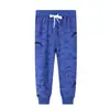 Jumpingmeters Marca Europeia e Americana Roupa Infantil 2026 Estilo Europeu e Americano Primavera e Outono Padrão de Dinossauro Calças Infantis Distribuição