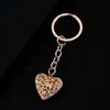 Llavero de acero inoxidable con forma de corazón hueco transfronterizo, portafotos, en stock, acabado espejo, puede sostener fotos, llavero de metal