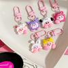 Llavero rosa caqui dulce con dibujo de niña linda con forma de corazón, bolso de estudiante, colgante para mochila, accesorios creativos Sanrio