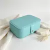 Caja de embalaje para joyería de cuero PU operada de fábrica, caja de joyería larga con botón a presión para uñas postizas, pendientes, collares y joyería, con impresión personalizada