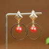 Moda pendientes imperiales de arena incrustada pendientes cabeza de Buda de cinabrio pendientes de lingote regalo al por mayor suministro en vivo